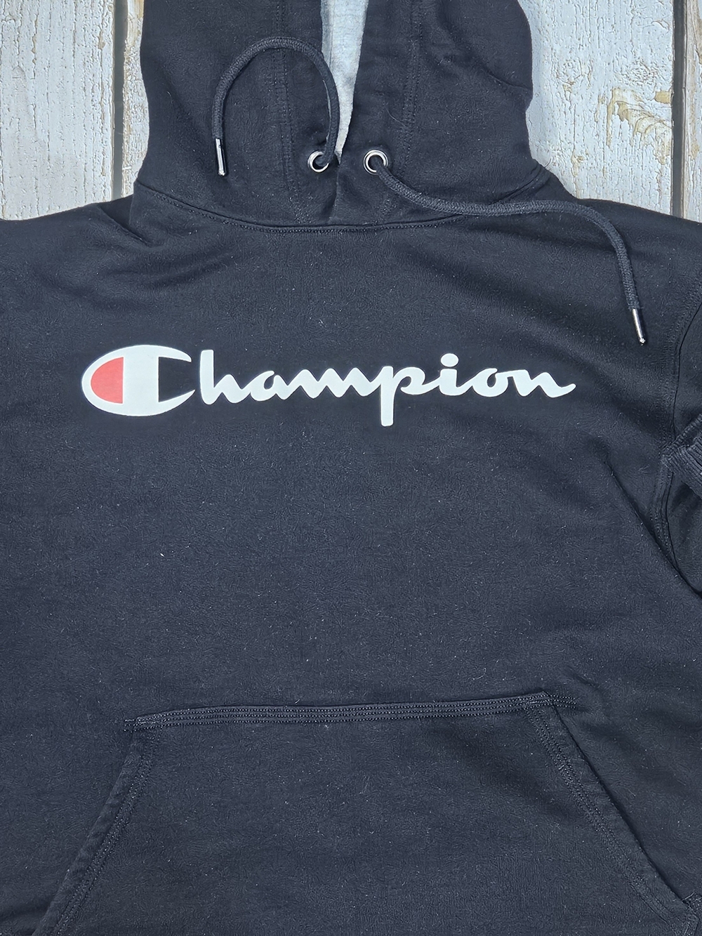 Men's Champion Black Hoodie with White Script and Red Logo